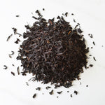 Load image into Gallery viewer, texture of passion fruit loose leaf black tea
